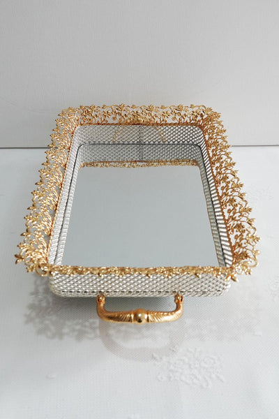 Glasiertes goldenes Spiegeltablett